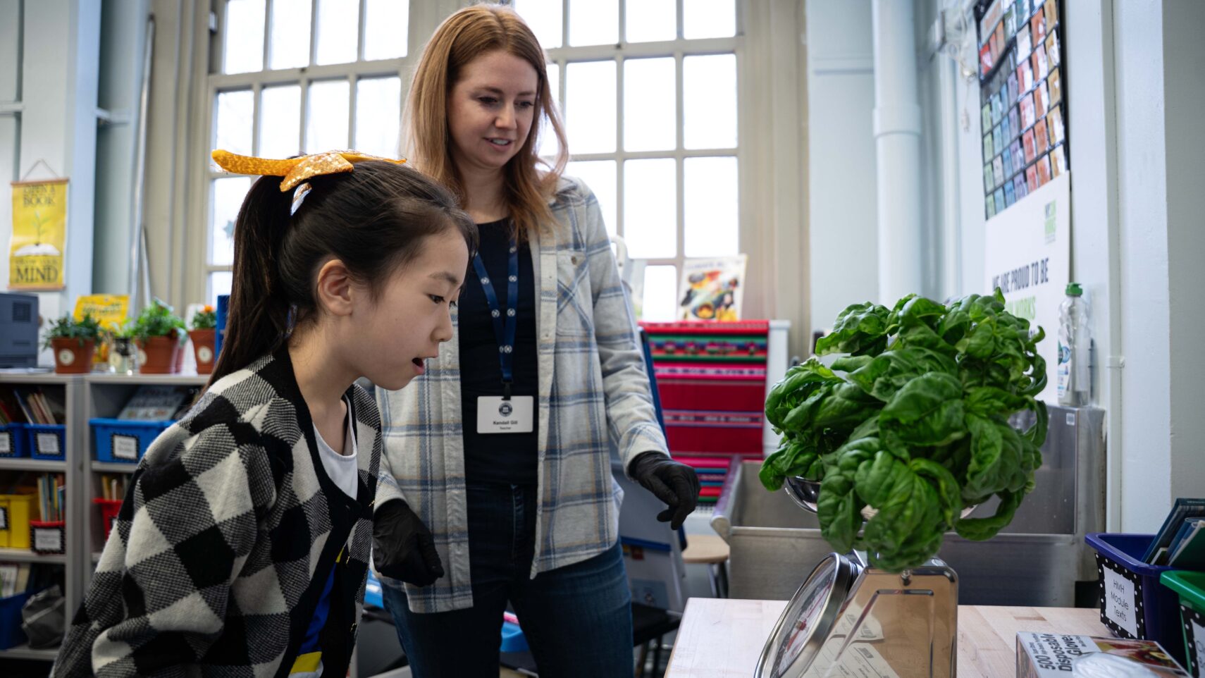 Teacher and students at PS144Q weigh a harvest